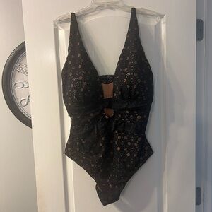 NWOT Meetcurve black with swimsuit with cutout detail over nude lining. Size 3XL